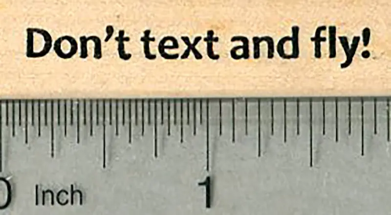 ‘Don’T Text And Fly’ Witch-Themed Safety Stamp 1